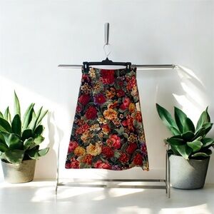 Red with flowers skirt is used but it’s in good condition